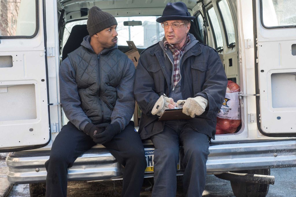 This photo provided by Warner Bros. Pictures shows Michael B. Jordan, left, as Adonis Johnson and Sylvester Stallone as Rocky Balboa in Metro-Goldwyn-Mayer Pictures', Warner Bros. Pictures' and New Line Cinema's drama "Creed," a Warner Bros. Pictures release. (Barry Wetcher/Warner Bros. Pictures via AP) ORG XMIT: CAET187